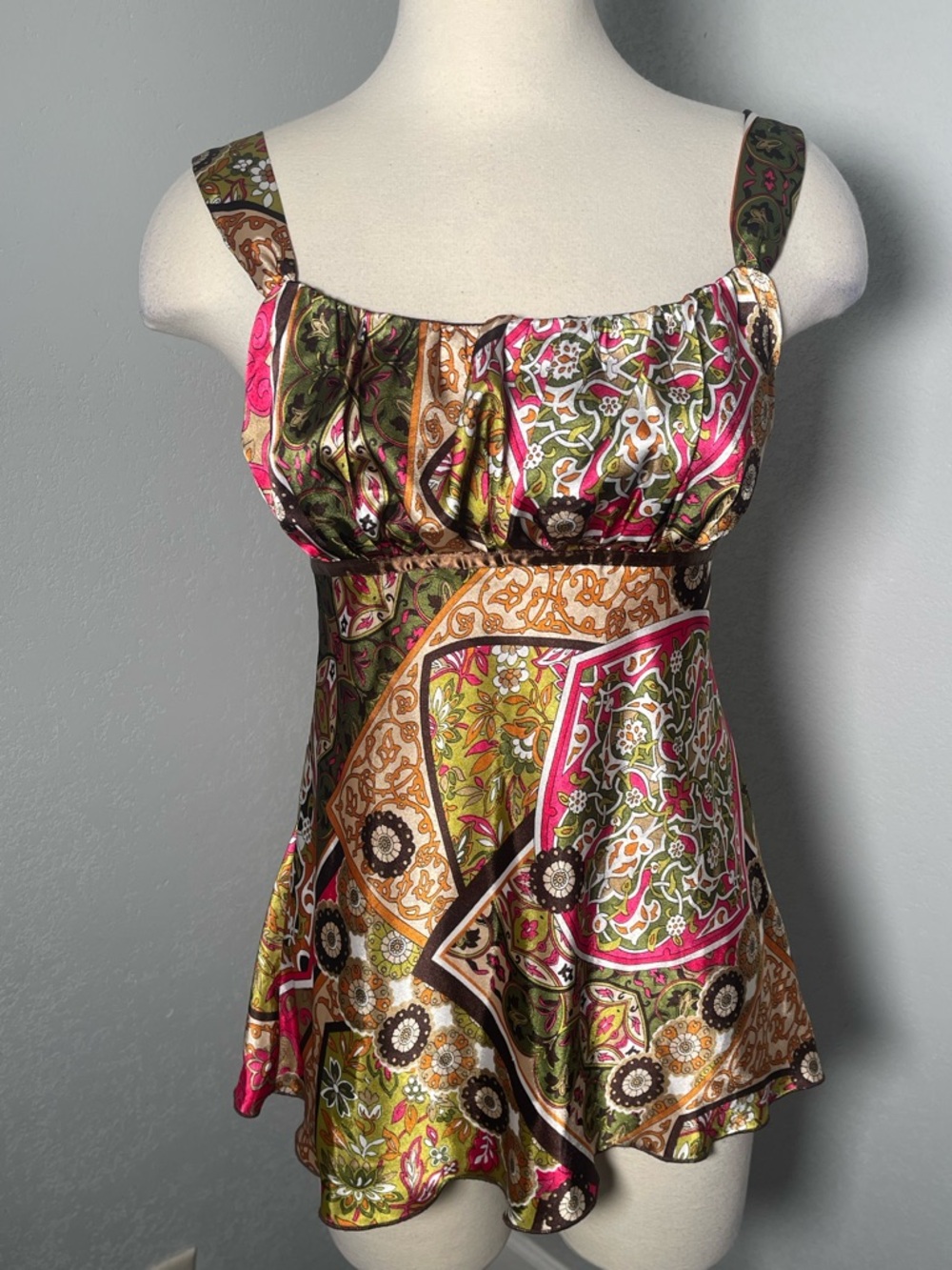 B. Wear Y2K-style patterned flowy tank top.